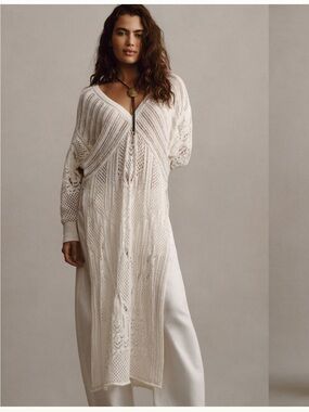 Open-Stitch Side-Slit
Tunic Sweater
Anthropologie long sleeve knit
Cream ivory